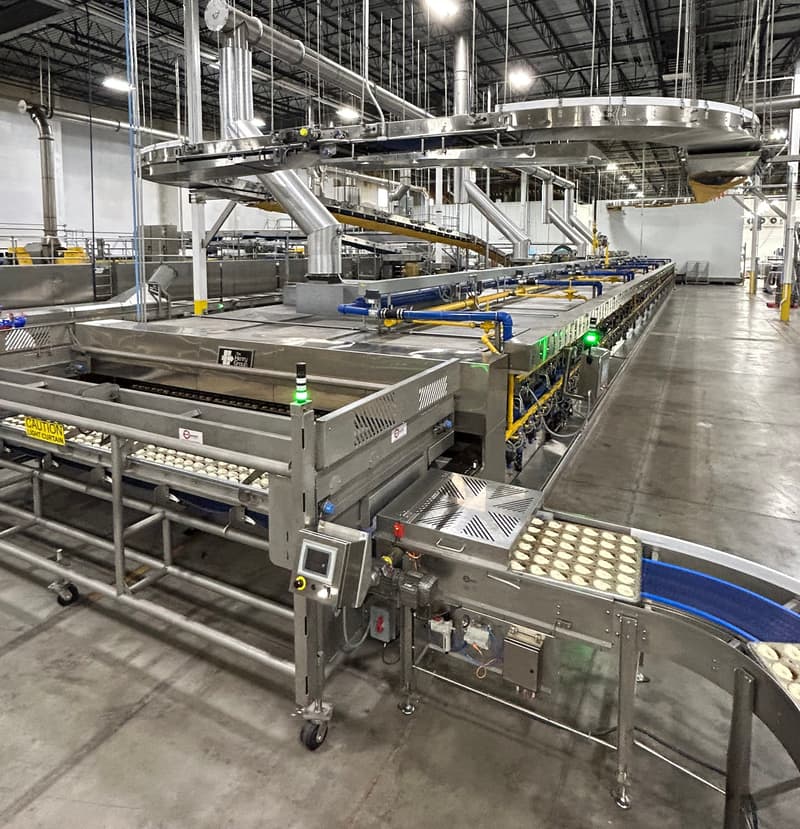 A complete THG bakery line: the oven, overhead conveying and product on the take-away conveyor