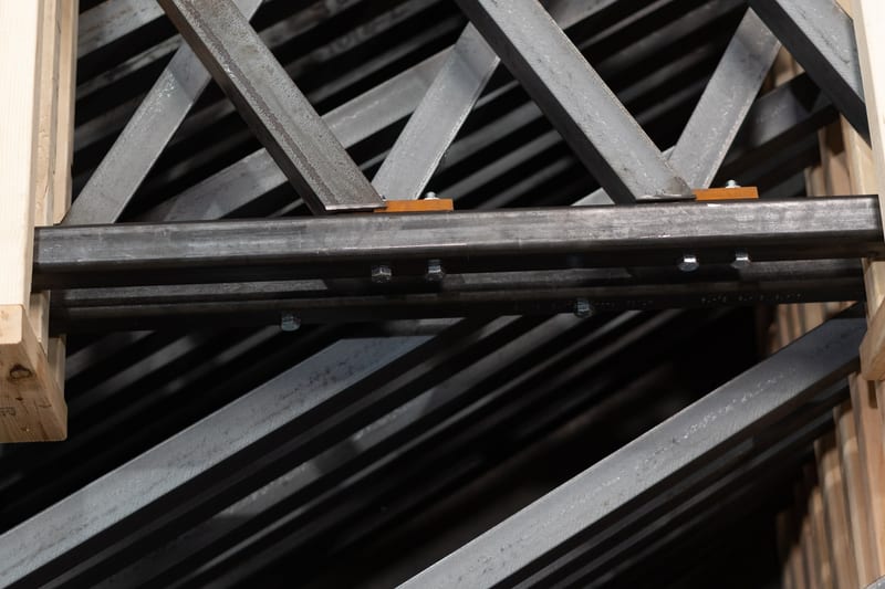 Stacked steel frames with diagonal bracing in the THG shop