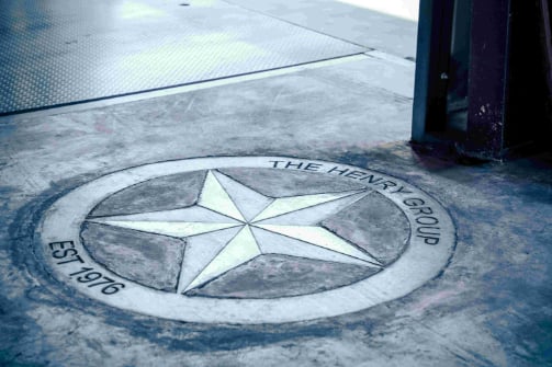 The Henry Group shop emblem